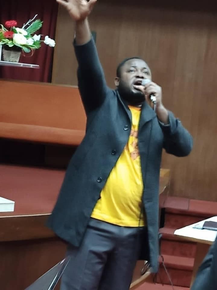 Rev. Courage Tengey ministering at a church in Ghana